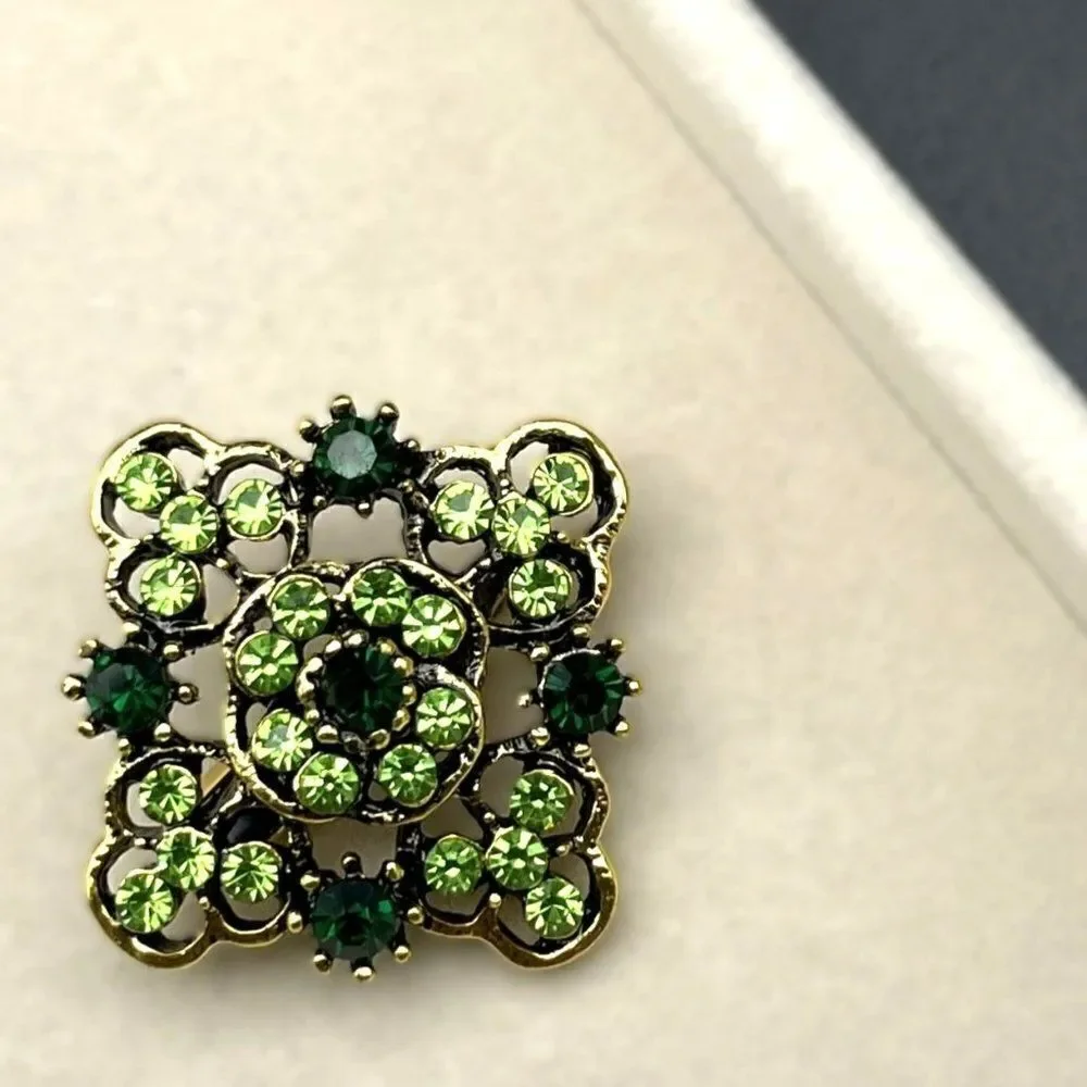 Yellow Gold with Emerald and Peridot Green Crystal Ornate Pin Back Brooch